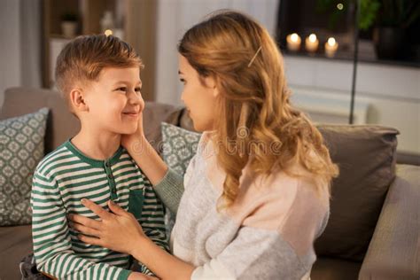 Happy Smiling Mother Talking To Her Son At Home Stock Photo Image Of