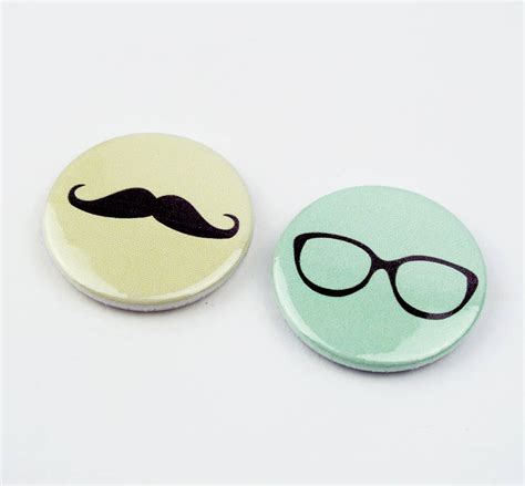 set of two geek chic pin badges by sarah hurley