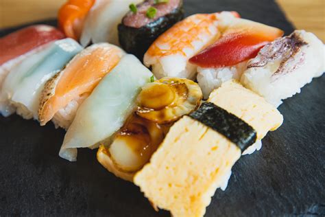 Traditional Japanese Sushi Covered With Raw Fish · Free Stock Photo