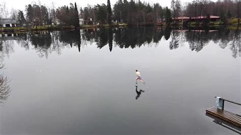 Race To The Finnish Line Man Sprints Across Frozen Lake