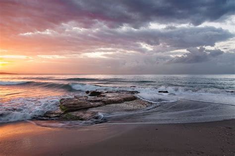 Stormy Orange Beach Sunrise Download This Photo By Quino Al On
