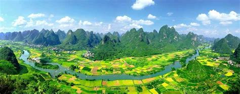Yulong River In Guilin Where The Rapeseed Flower Field Extends For
