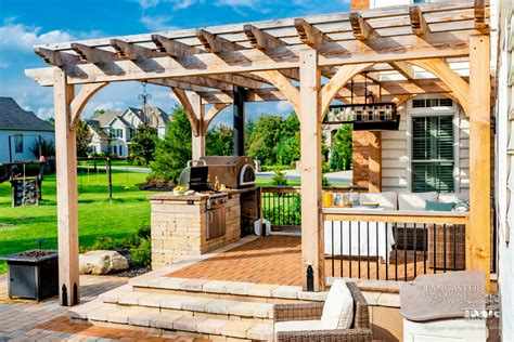 Pergola With An Outdoor Kitchen Design An Outdoor Oasis