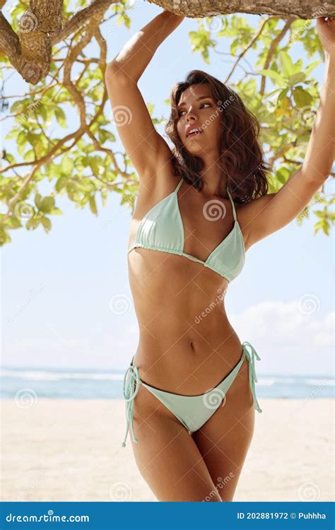 Beautiful Girl S In Stylish Bikini Portrait Posing On Sandy Beach In Bali Indonesia Front