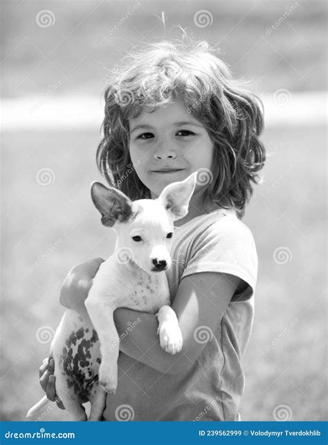Close Up Portrait Of Cute Child Hugging Dog Little Boy Hugging A Dog