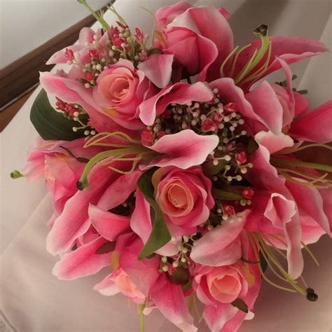 A Wedding Bouquet Of Artificial Silk Roses And Lily Flowers Abigailrose