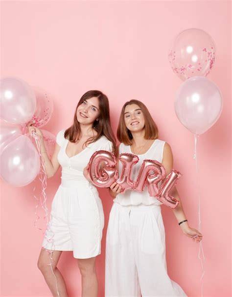 Premium Photo Portrait Of Happy Two Young Women Dressed In A White