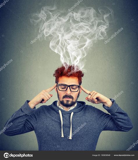 Man Thinking Very Intensely Having Headache With Steaming Coming Out