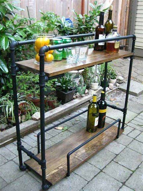 The black and brushed gold frame supports espresso shelves where treats and kitchen supplies may be laid out for easy access. Top 23 Extremely Awesome DIY Industrial Furniture Designs ...