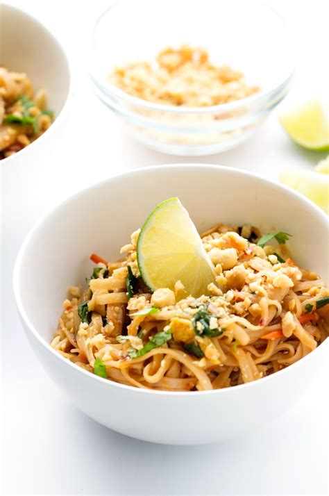 Rice noodles are tossed with chicken, peanuts, garlic and simple homemade sauce for a ridiculously delicious chicken pad thai! Easy Chicken Pad Thai Recipe | Little Spice Jar