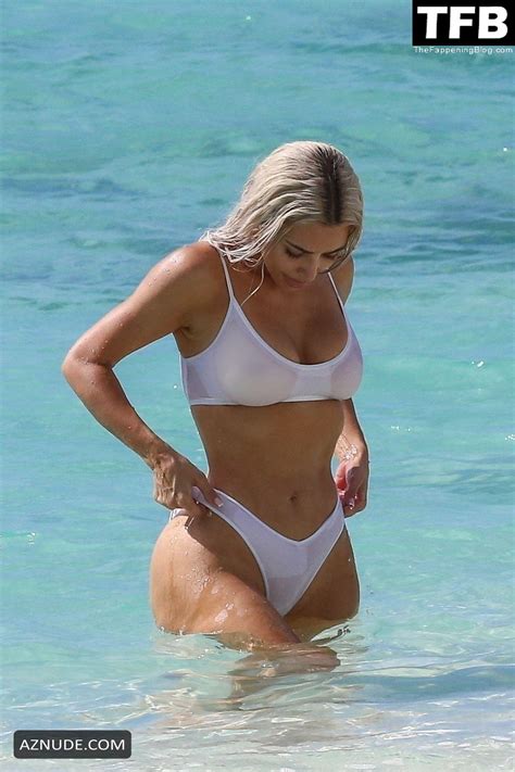 Kim Kardashian Sexy Seen Showing Off Her Hot Figure In A White Bikini