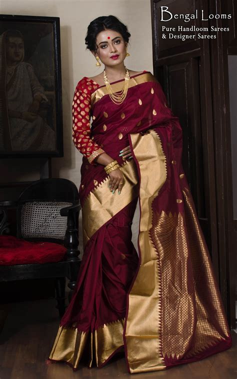Art Silk Kanjivaram Saree In Maroon And Gold Saree Blouse Neck