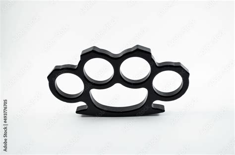 Black Brass Knuckles On The Isolated White Background Stock Photo