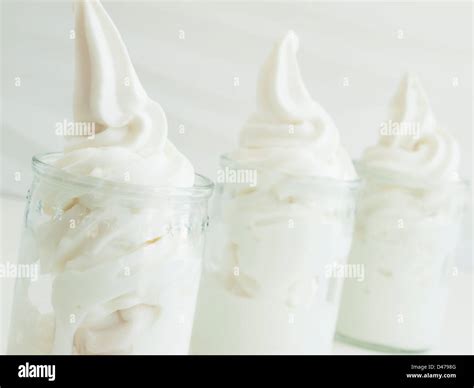 Frozen Soft Serve Yogurt In Glass On White Background Stock Photo Alamy