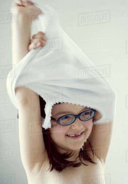 Girl Taking Off Clothes Stock Photo Dissolve