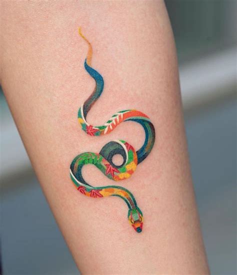 A Colourful Snake Tattoo Snake Tattoo Design Anklet Tattoos Snake
