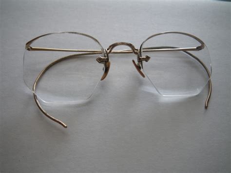 vintage american optical eyeglasses semi rimless gold by moxiekin