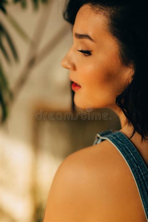 Sensual Profile Of An Attractive Brunette With Bare Shoulders Stock