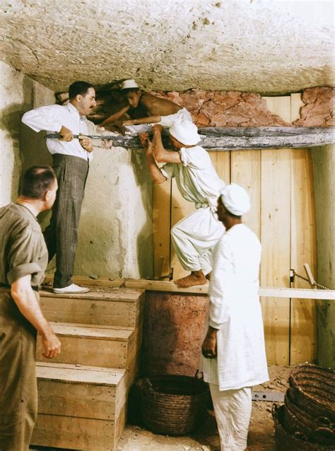 Three Men Working On An Unfinished Ceiling In A Room That Is Being