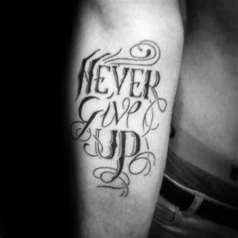 Never give up, unbreakable, strength and courage. 60 Never Give Up Tattoos For Men - Phrase Design Ideas
