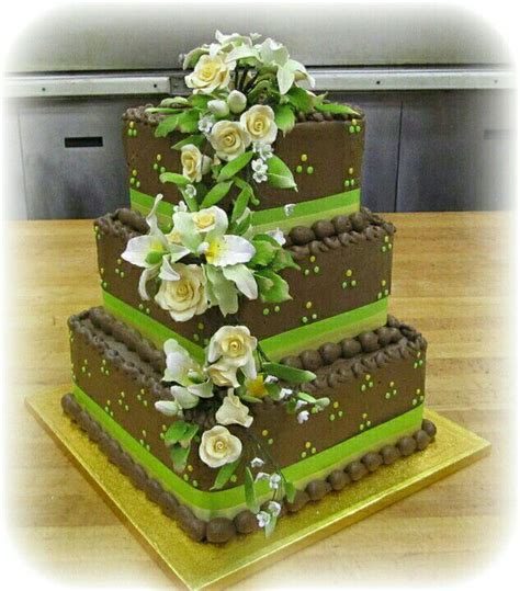 Maybe you would like to learn more about one of these? Square stacked buttercream wedding cake with gumpaste ...