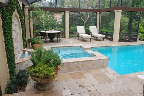 It's the largest freestanding acrylic pool structure in the world. French Country Style Garden - Traditional - Pool - other ...