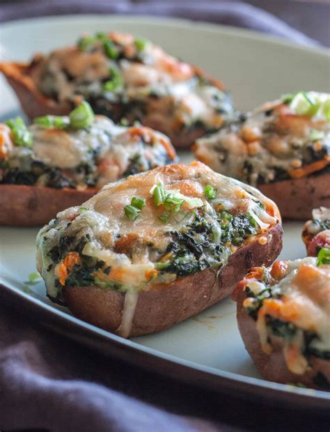 3) in a large baking dish add the cubed potatoes, remaining rosemary, garlic cloves, and 2 tbsp of the olive oil. Ham and Spinach Stuffed Sweet Potato Skins - Sweetphi