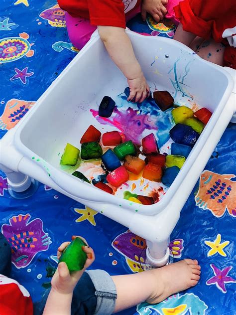 The first experiment we did was ongoing as we played with our other experiment. Colorful ice cubes. Wet and messy. Sensory activity ...