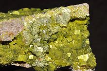 When held, uranium 235 gives the player radiation effect for 150 seconds (2 minutes 30 seconds). Uranium ore - Wikipedia