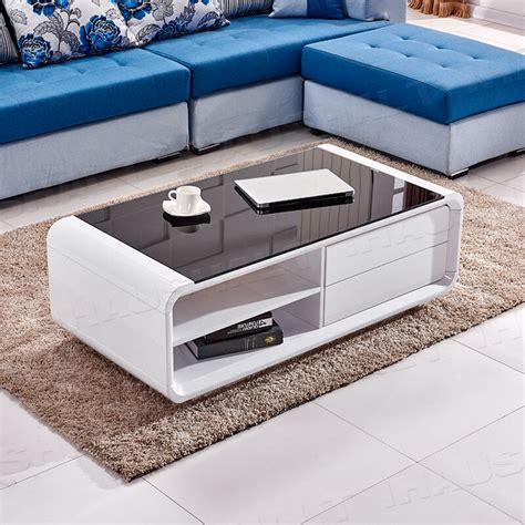 A decorative lower shelf offers additional storage surface area. Modern Large Storage High Gloss Coffee Table With 2 ...