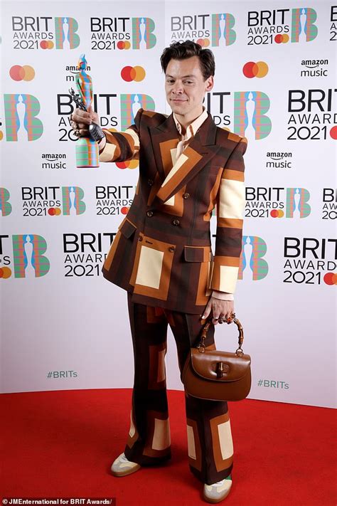 Buy harry styles tickets from ticketmaster uk. BRIT Awards 2021: Harry Styles carries brown leather Gucci ...