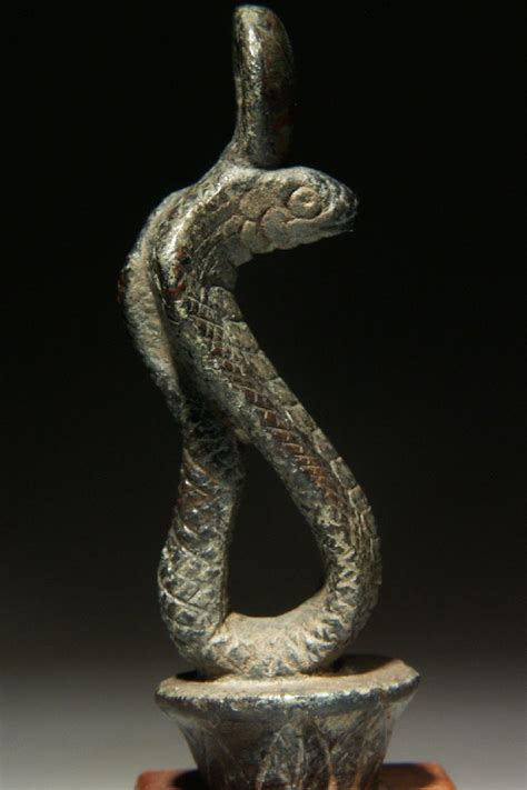 Bronze Statuette Of A Cobra The Animal Is Depicted Surmounting The Top