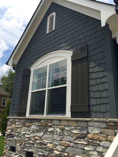 To find the best gray exterior paint for your home, consider the surrounding landscape and nearby architecture. ARH Exterior Plan Woodcliff (Exterior 52) Roof: OC Oakridge Williamsburg Gray, Metal Roof ...