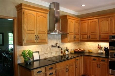 This guide will help you learn which types of granite are the best fit for oak cabinets. Elegant Kitchen Light Cabinets with Dark Countertops ...