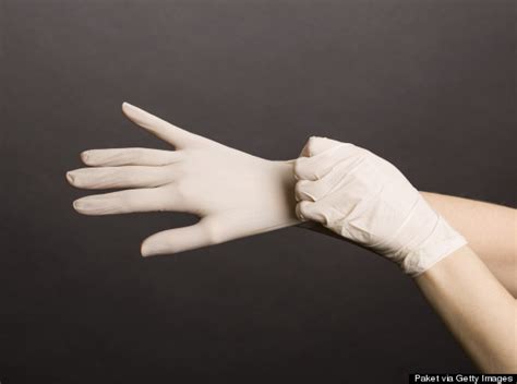 Alternative Contraception Young People Using Cling Film Sandwich Bags And Latex Gloves In The