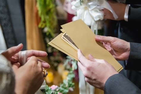 Bringing a gift of some kind is proper etiquette for those attending a wedding, whether it is a material item or monetary gift. Determining Appropriate Cash Gifts for a Wedding | LoveToKnow