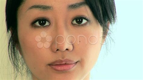 Close Up Portrait Of Smiling Young Asian Woman Face Stock Footage