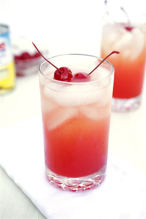 Using pineapple juice, malibu rum, and grenadine.its the perfect summer cocktail! Pineapple Sunset Cocktail