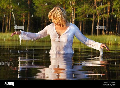 Woman Swimming In Dark Forest Lake Nice Reflection From Water Stock Photo Royalty Free Image