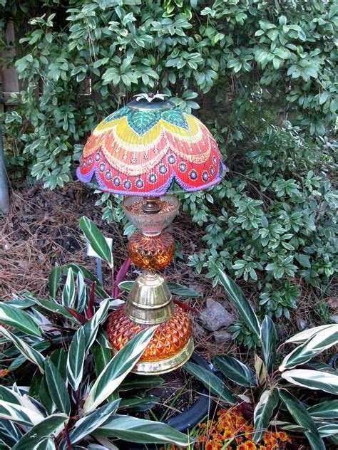 Whimsical Garden Art | Whimsical garden lamps and bird feeders | Whimsical garden art, Whimsical ...