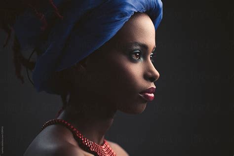 african woman with a blue turban by stocksy contributor lumina stocksy