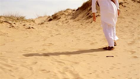 Arab Man Walking In Desert Stock Footage Video 100 Royalty Free