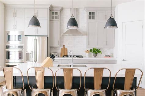L shaped kitchen boasts dark gray walls painted benjamin moore iron mountain framing white shaker cabinets paired with dark granite countertops and mosaic marble linear tiled backsplash. Dark Gray Kitchen Island with Black Industrial Pendants - Transitional - Kitchen - Benjamin ...