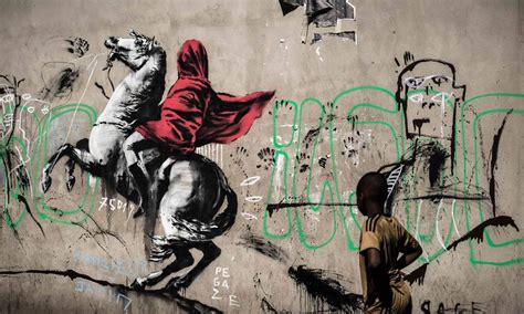 Atribuídos A Banksy Grafites Sobre A Imigração Surgem Em Muros De