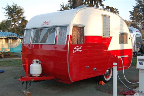 Our aim is to provide a way to own a fabulous vintage camper at a cost that allows you to feel good about the investment. Classic 1956 Shasta canned-ham trailer in red & white ...