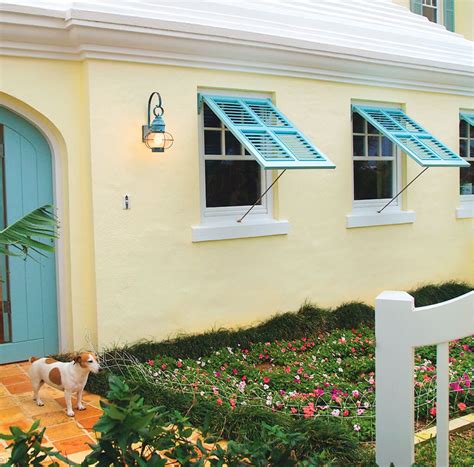 Window shutters are designed with two functions in mind. Shutters for Tropical Homes | Exterior house colors, House ...