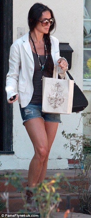 All That Yoga Must Be Paying Off Demi Moore 50 Parades Her Super Toned Pins In Ripped Denim