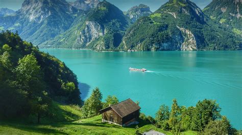 The top ten swiss mountains. View of Lake Lucerne by mountains and blue sky ...