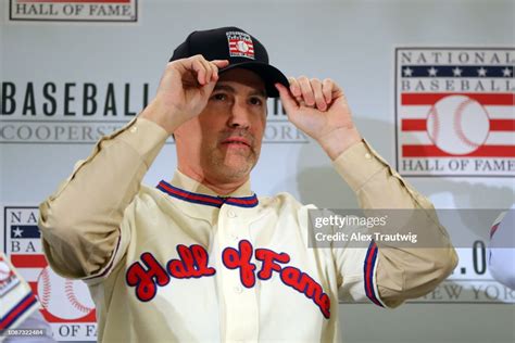 Mike Mussina Puts On His Hall Of Fame Cap During The 2019 Baseball