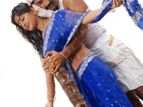 sneha sensual song sequence in wet saree with simbu in tamil movie silambattam wet actress